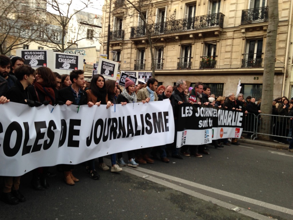 Journalism students march together in a rally for solidarity and in honor of freedom of the press, which was attacked by terrorists Wednesday morning. 